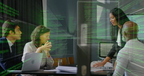 Presenter tapping laptop activating code flowing onscreen as team analyzing data Video stock 314174898