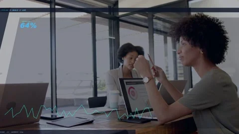 Presenter tapping tablet and pointing charts for business decision, team Stock Footage 333602337