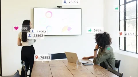 Presenter tapping tablet and pointing marketing chart creating floating social Stock Footage 335235488