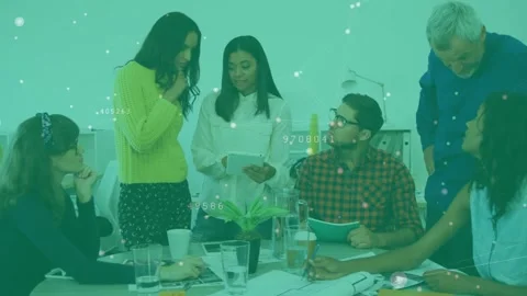 Presenter tapping tablet generating floating data while colleagues taking notes Stock Footage 317260771