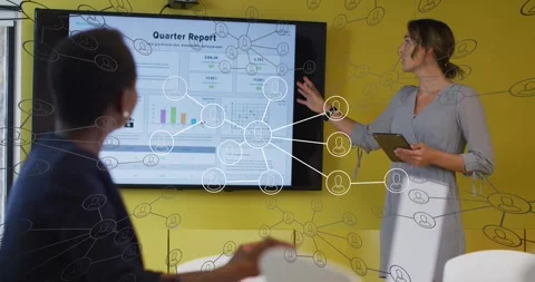 Presenter tapping tablet, pointing at Qtr Report in business review, overlay Stock Footage 329929632