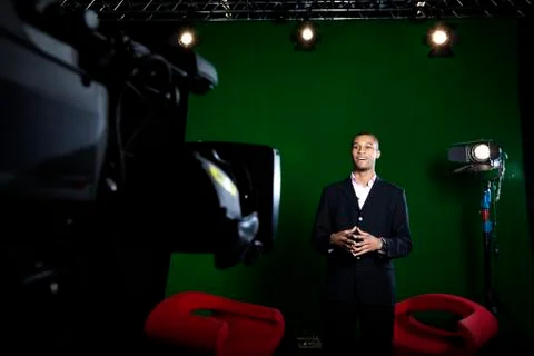 Presenter in tv studio Photos