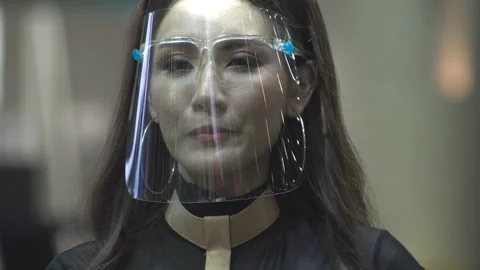 Presenter wearing protective face shield. Stock Footage 136203255
