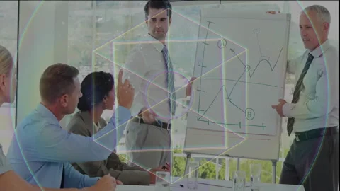 Presenter writing and circling flip chart points after team member question in Stock Footage 311883289