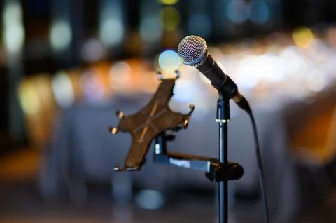 Presenter's microphone at an event Stock Photos