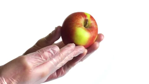Presenting an apple Stock Footage 151658298
