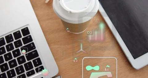 Presenting brown coffee cup displaying floating eco icons on office desk, with Stock Photos
