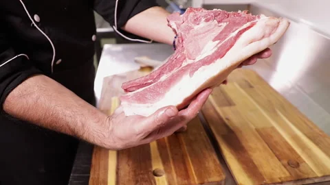 Presenting Cut Pork Rib to the customer Stock Footage 248749410