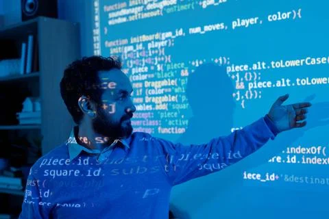 Presenting Data Analysis on Digital Screen in Dark Room Foto stock