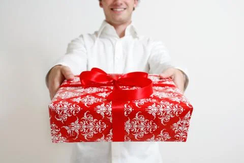 Presenting a gift Stock Photos
