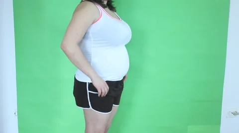 Presenting overweight body  Stock Footage 46378450