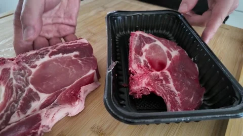 Presenting Raw Pork Collar and Pork Chop Stock-Footage 347907171