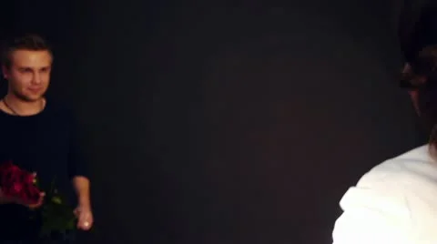 Presenting roses Stock Footage 20542259