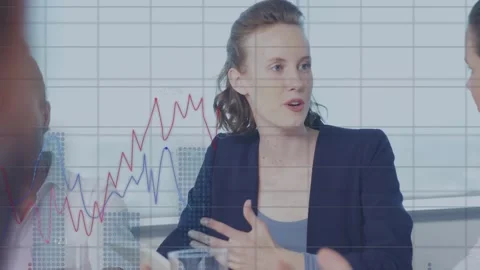 Presenting woman in navy blazer gesturing and explaining red-blue graphs on Stock Footage 333904323