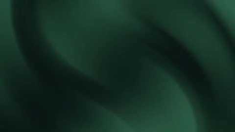 Presents an abstract dark green background with blurred flowing shadows. Video stock 333130763