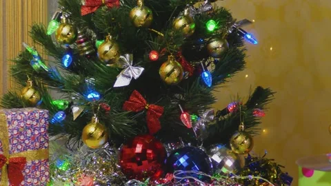 Presents. Christmas tree with big balls and lights. Glass figure Stock-Footage 144479488