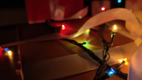 Presents for the family. Beautiful presents under the Christmas tree. New Year Video stock 120316341