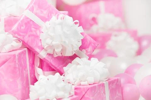 Presents gift boxes, pink background for female or woman birthday Stock Photos