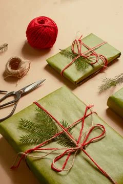 Presents scissors and thread for pacing top view christmas concept sale beige Stock Photos