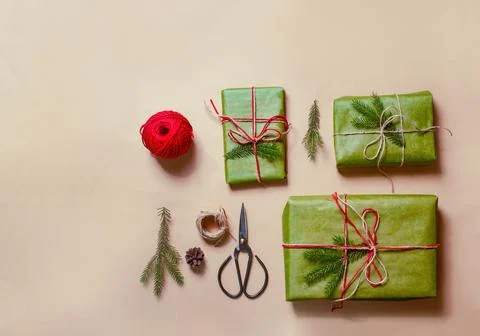 Presents scissors and thread for pacing top view christmas concept sale beige Stock Photos