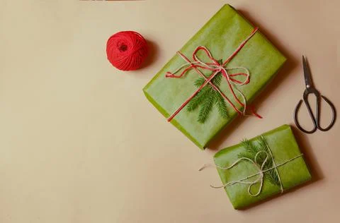 Presents scissors and thread for pacing top view christmas concept sale beige Stock Photos