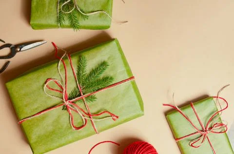 Presents scissors and thread for pacing top view christmas concept sale beige Stock Photos