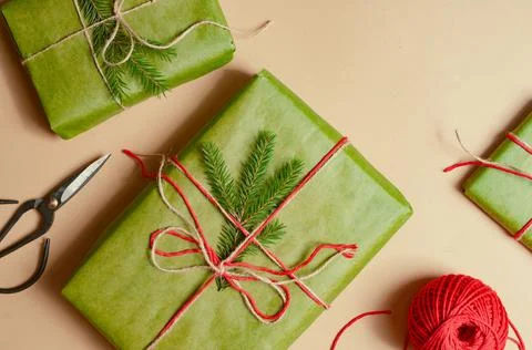 Presents scissors and thread for pacing top view christmas concept sale beige Stock Photos