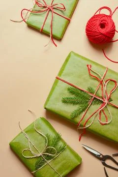 Presents scissors and thread for pacing top view christmas concept sale beige Stock Photos