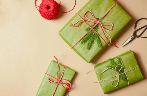 Presents scissors and thread for pacing top view christmas concept sale beige Stock Photos