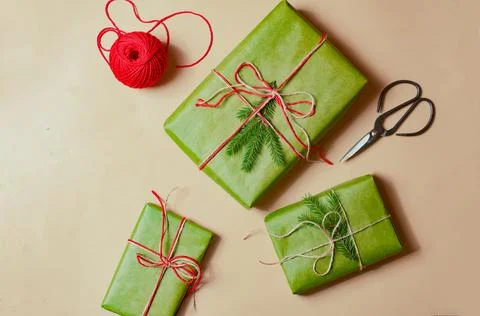 Presents scissors and thread for pacing top view christmas concept sale beige Stock Photos