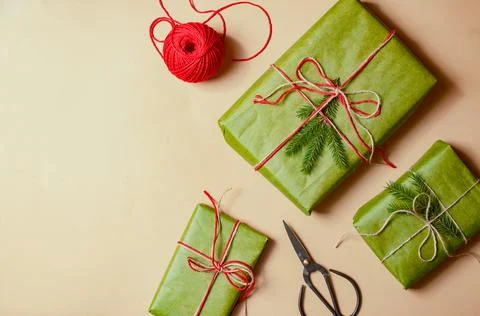 Presents scissors and thread for pacing top view christmas concept sale beige Stock Photos