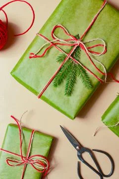 Presents scissors and thread for pacing top view christmas concept sale beige Stock Photos