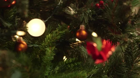 Presents by twinkling Christmas tree Video stock 136336331