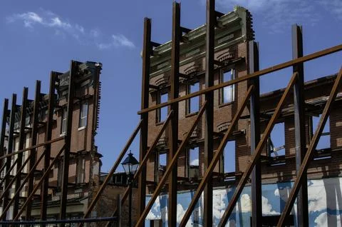 Preservation of brick facade in an urban setting. Stockfoto's