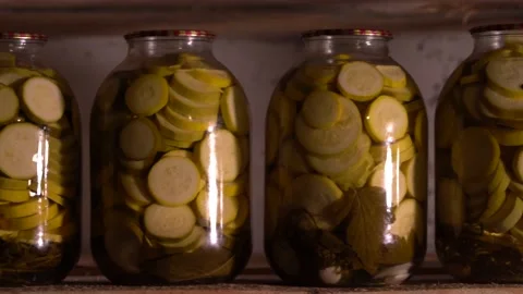 Preserves in jars. Vegetables canned for winter. Home basement with canned food. Vidéo 148074688