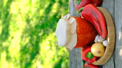 Preserving adjika in a jar. Selective focus. Stock Footage 293933893