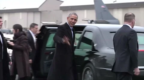 President Barack Obama waving hello as he walks by Stock Footage