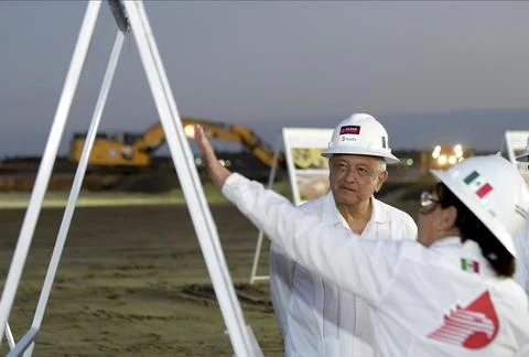 President Lopez Obrador walks through the Dos Bocas refinery in southeastern Mex Stock Photos