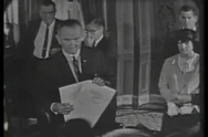 President Lyndon B Johnson Holds The Voting Rights Bill And Showcases The Stock Footage