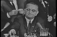President Lyndon B Johnson Signs The Civil Rights Act Into Law And Passes Pens Stock Footage