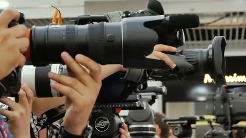 Press and media camera working on public news coverage event Stock Footage 73174656
