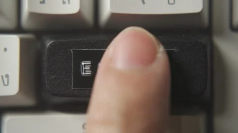 Press black enter button on a computer keyboard Stock Footage 291635367