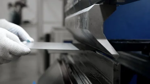 Press brake machine bending sheet metal in industrial workshop. Stock Footage 347782206