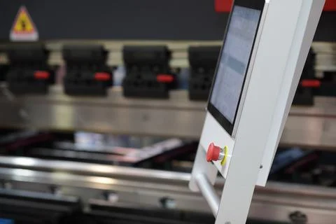Press brake machine control console close up Stock Photos