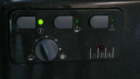 Press button on coffe making machine Stock Footage 145534688