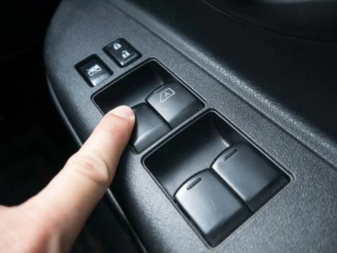 Press the button to open car windows Stock Photos