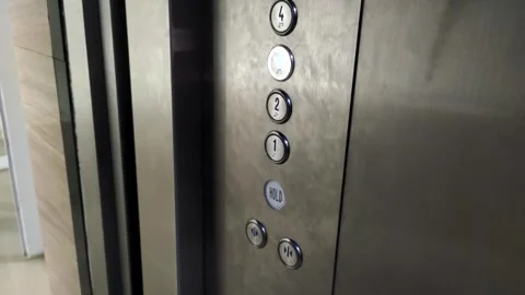 Press The Button for The Third Floor in An Elevator Stock-Footage 319969570