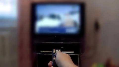 Press the button on your TV remote Stock Footage 70122495