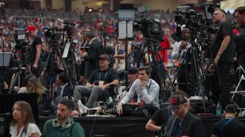 Press cameras at the back of the arena during the Charlie Kirk memorial service Stock Footage 345298183
