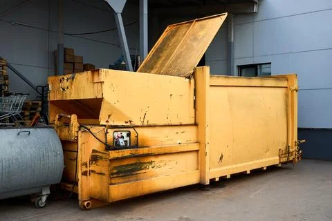 Press Container waste Compactor machine for Reducing Volume in yard of large 写真素材